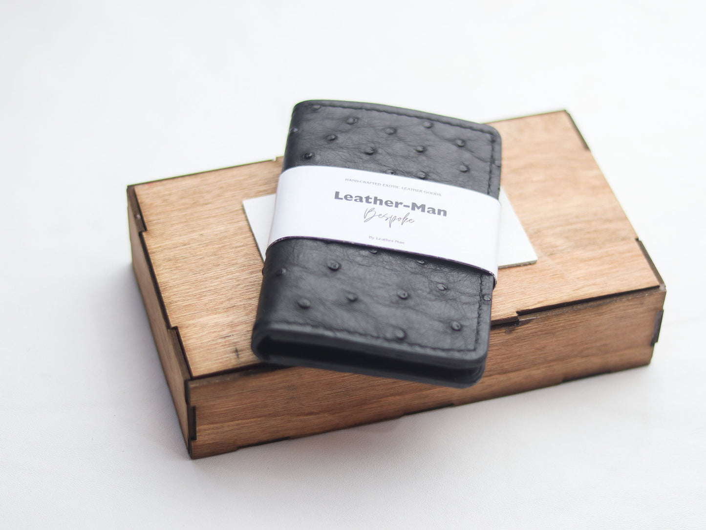 ARTEMUS - BIFOLD CARD WALLET RAVEN BLACK OSTRICH SKIN