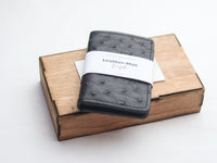 ARTEMUS - BIFOLD CARD WALLET RAVEN BLACK OSTRICH SKIN