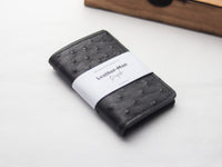 ARTEMUS - BIFOLD CARD WALLET RAVEN BLACK OSTRICH SKIN