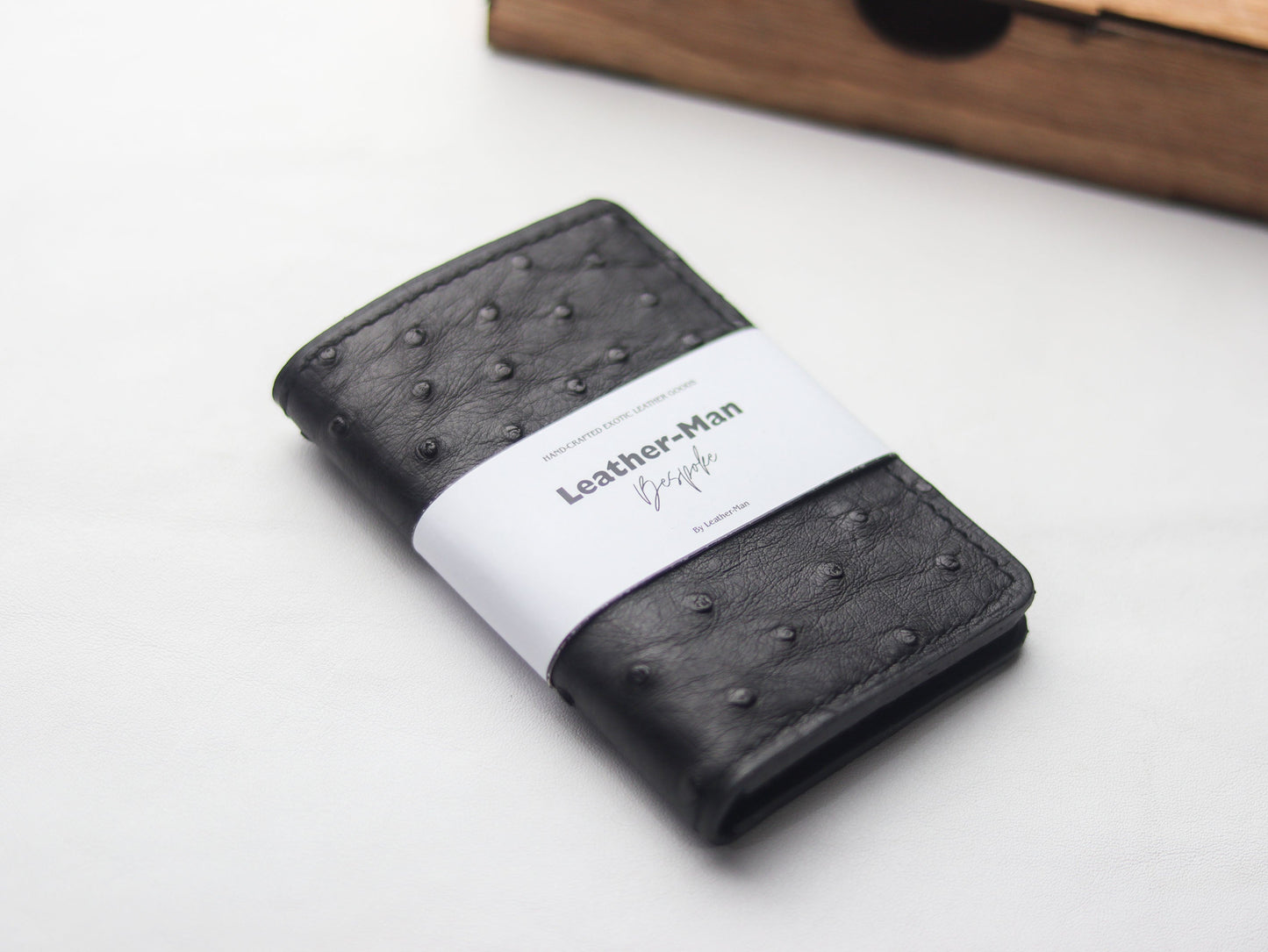 ARTEMUS - BIFOLD CARD WALLET RAVEN BLACK OSTRICH SKIN