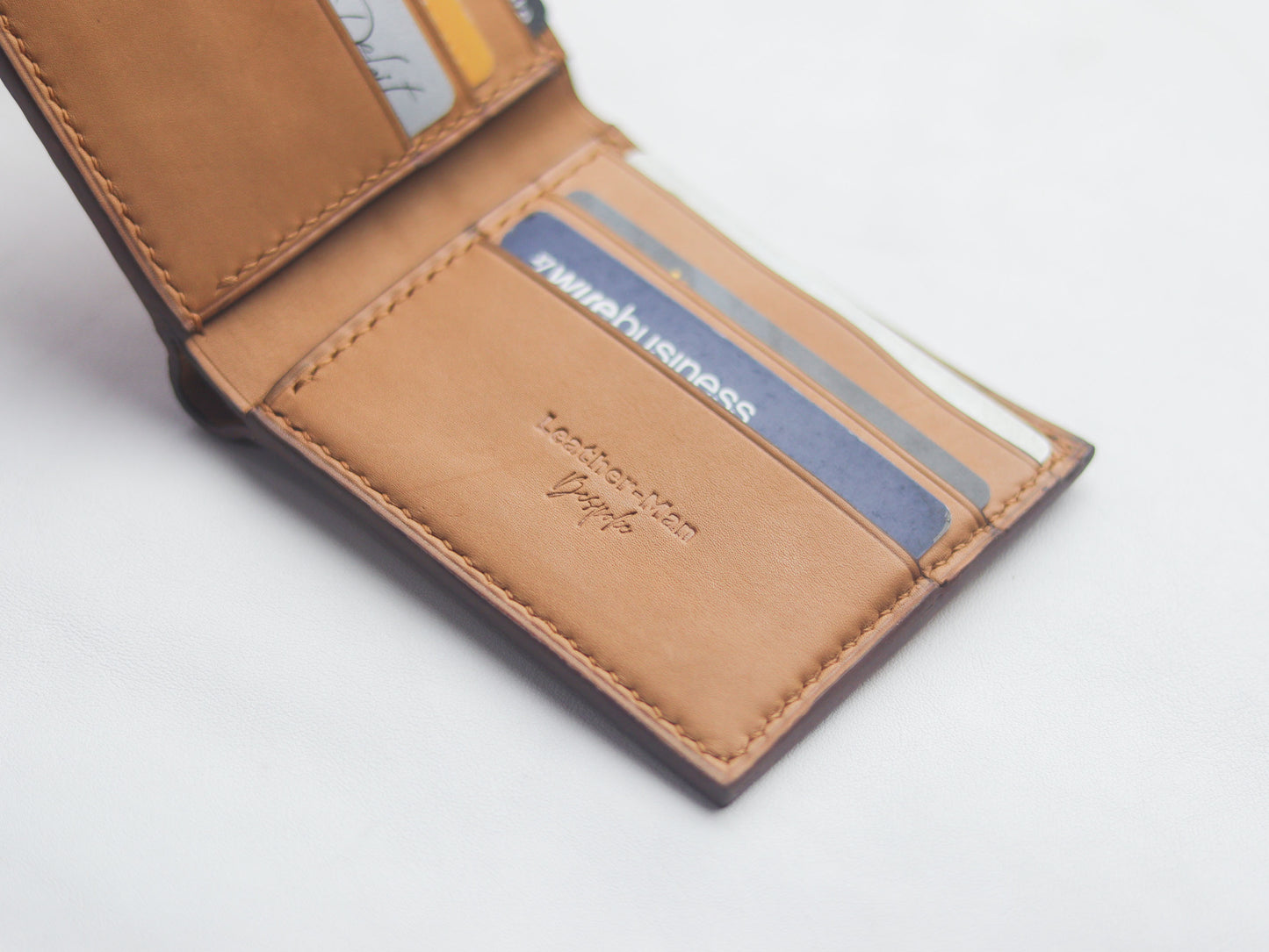 WYNTON - BIFOLD WALLET COPPER BROWN PYTHON SKIN